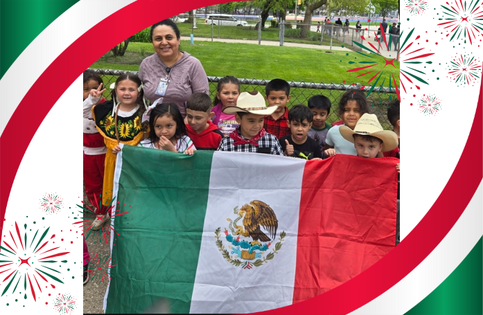 group of kids and 1 adult holding the mexican flag